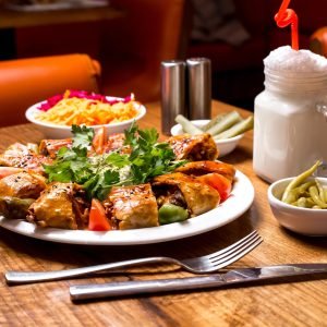 beyti kebab served with ayran and pickles